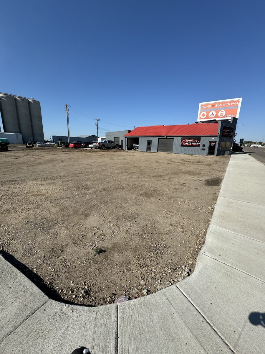 Graded commercial lot base prepared for paving in the oil patch