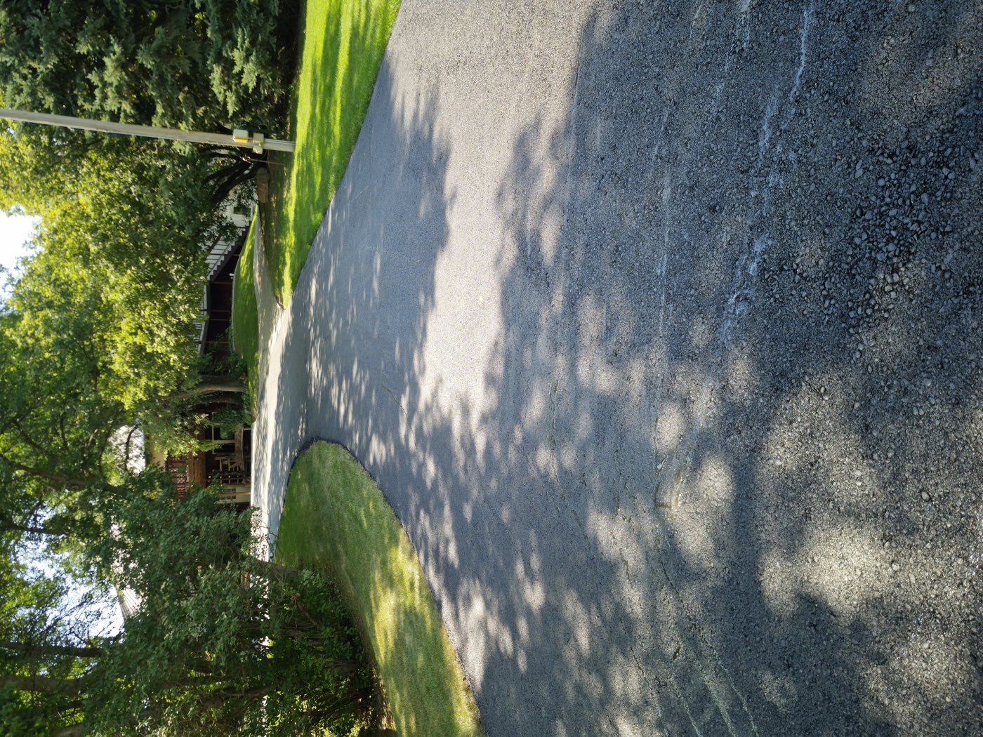 Same driveway after a 2-inch asphalt overlay