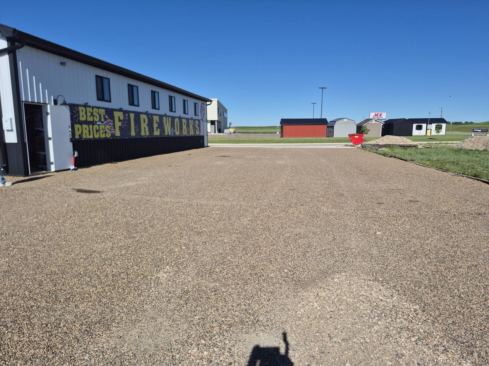 Gravel lot in front of the fireworks stand before paving