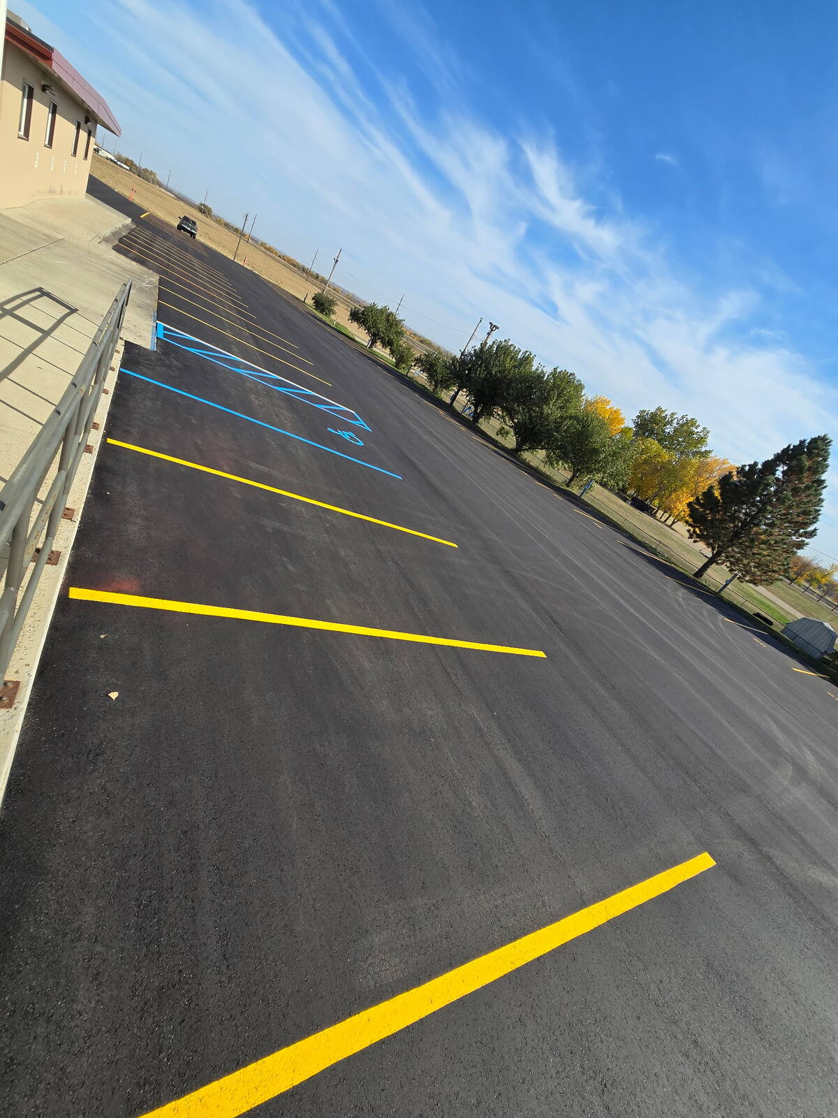 New yellow and blue striping on the overlaid lot